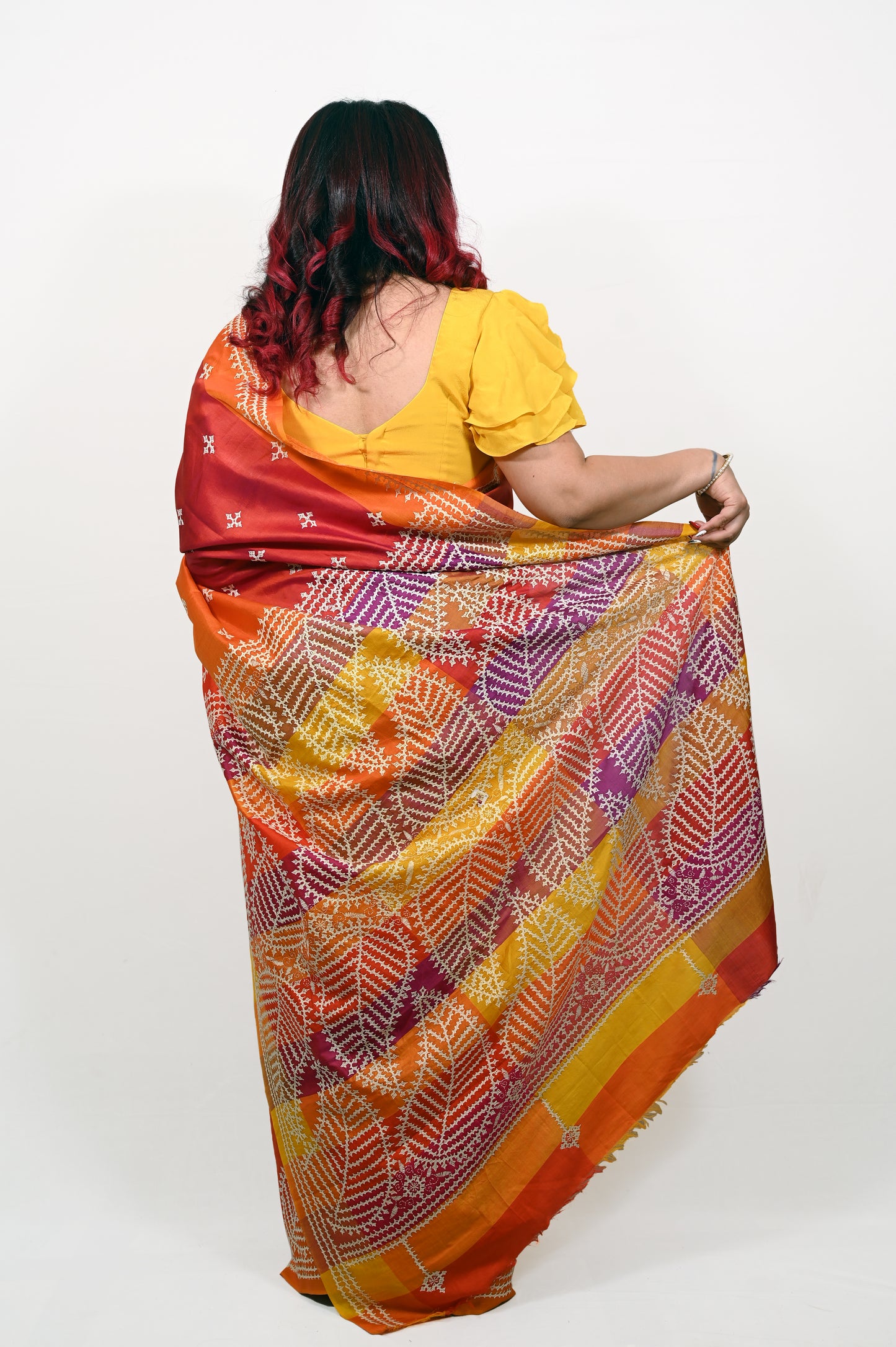 Kutchi Hand Embroidered Pure Katan Silk Saree in Shades of Orange, Red, and Yellow